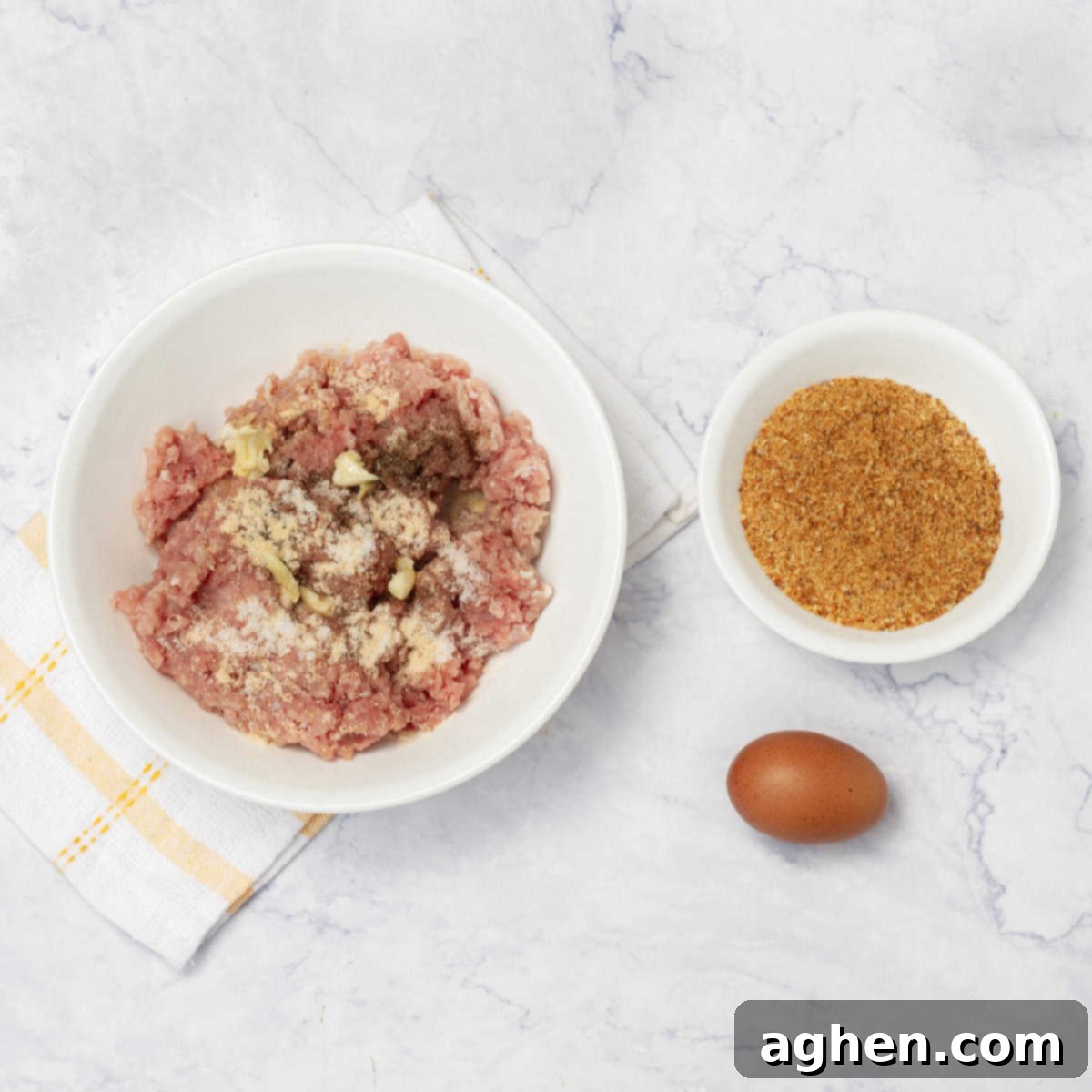 Weight Watchers Pork Burgers: Grill-Time Perfection 4 A bowl of pork with flour on it and another bowl of breadcrumbs