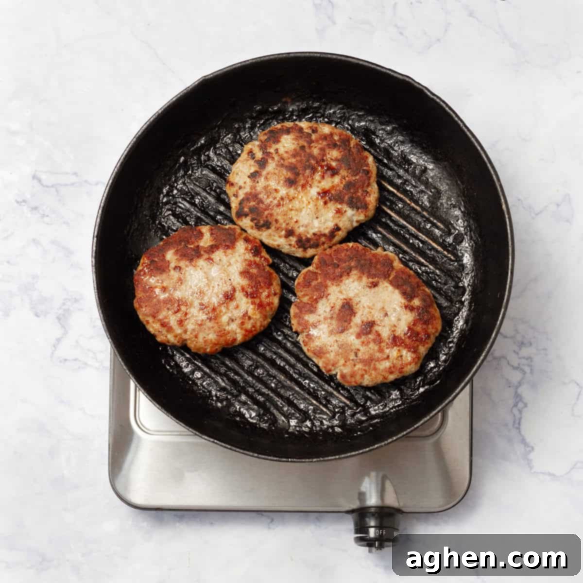 Weight Watchers Pork Burgers: Grill-Time Perfection 6 3 burger patties cooking on pan
