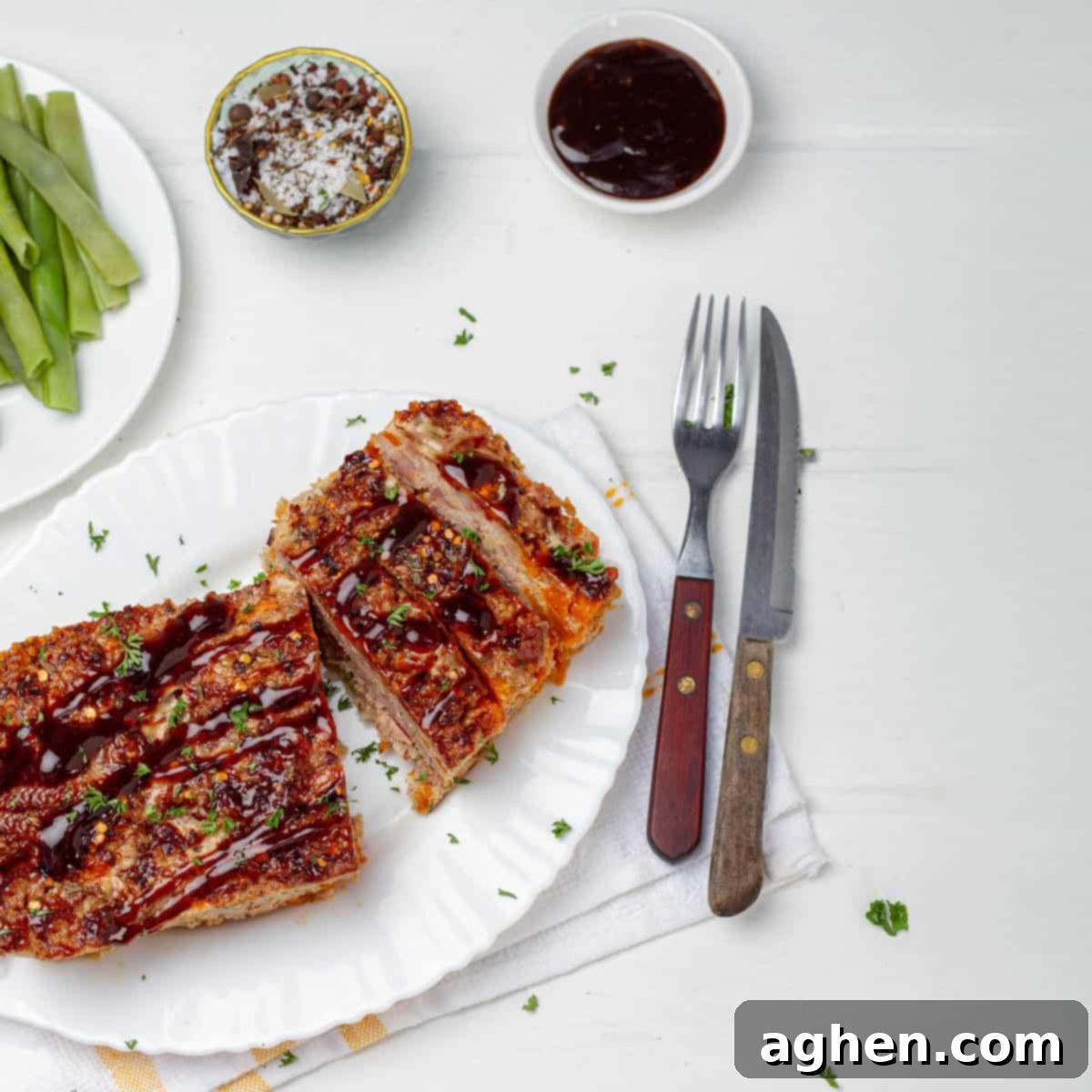 Martha Stewarts Butternut Squash Meatloaf For Weight Watchers 2 Pork Meatloaf served in a plate with spoon and fork