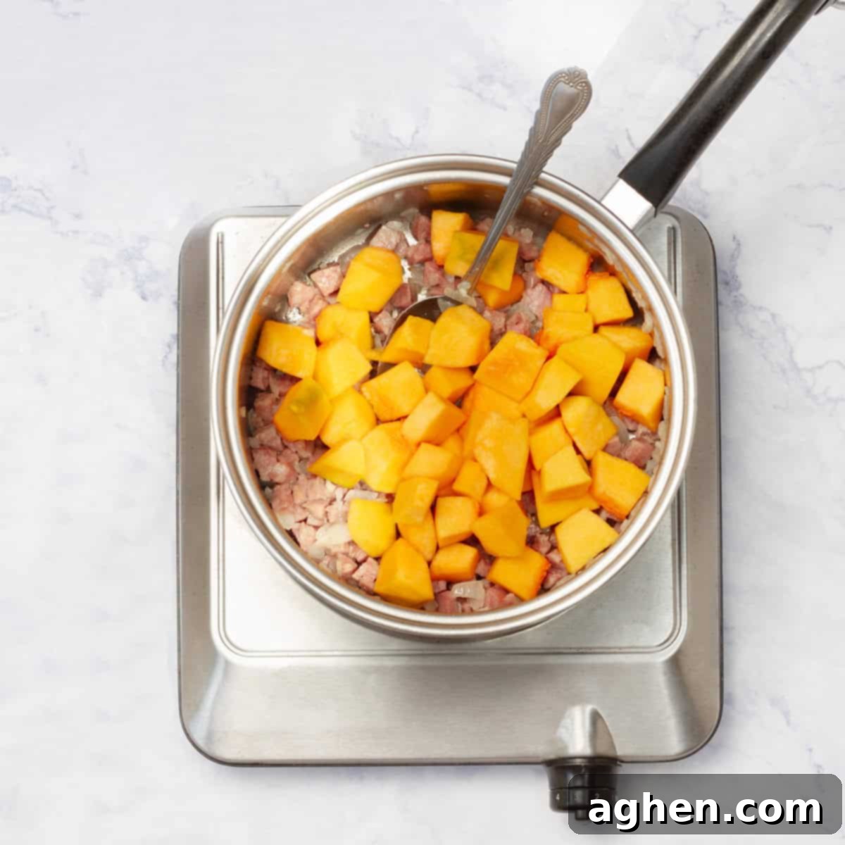 Martha Stewarts Butternut Squash Meatloaf For Weight Watchers 5 diced butternut squash and diced smoked turkey sausage to the skillet with the sautéed onion and garlic