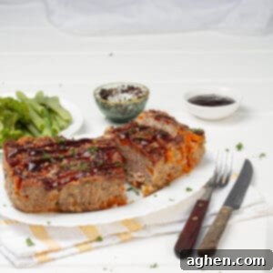 Martha Stewarts Butternut Squash Meatloaf For Weight Watchers 9 Pork Meatloaf served in a plate with spoon and fork