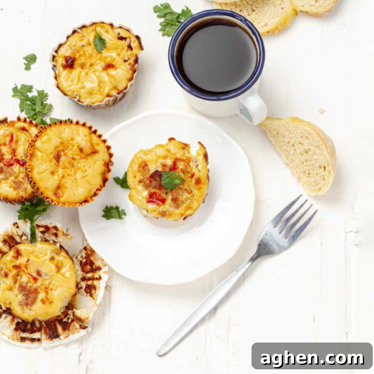 Weight Watchers Pork Egg Bites: Effortless On-the-Go Breakfast Solution 8 Golden brown Pork Egg Cups fresh out of the oven, presented with a cup of black coffee on a wooden board.