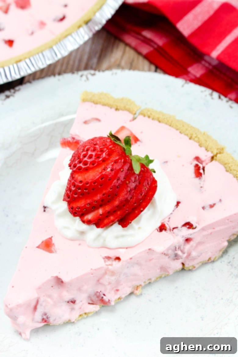 Effortless Strawberry Gem Pie 8 Pink jello pie with strawberries and Cool Whip.