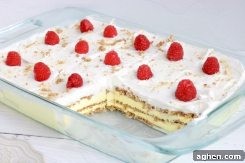 No Bake Lemon Pudding Cake with a few slices removed to show layers