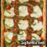 One-Pan Wonder Pizza 8 Sheet Pan Pizza with spinach, mozzarella, and peppers