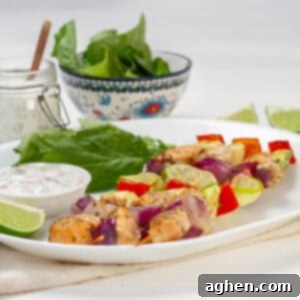 Zesty Herb Salmon Skewers 9 Salmon Skewers served with lemons and greens