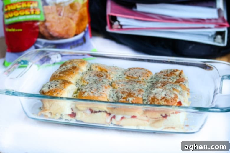 Hawaiian roll chicken parm sliders in 9x13 casserole dish.