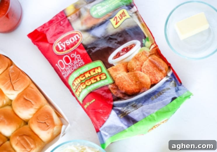 Chicken Slider Ingredients: Tyson chicken nuggets, butter, Hawaiian rolls, marinara sauce, and shredded cheese.