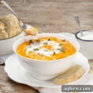 Velvety Roasted Carrot Soup 8 Roasted Carrot Cream served in a bowl