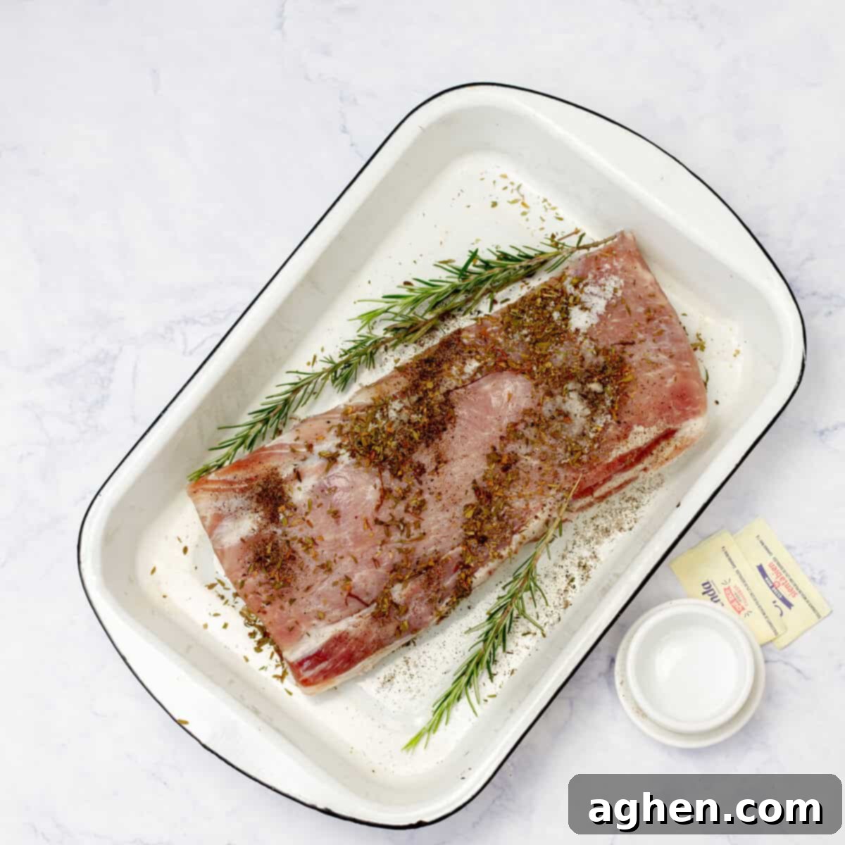 Plum-Glazed Pork Loin 4 Pork loin with plum sauce in backing tray