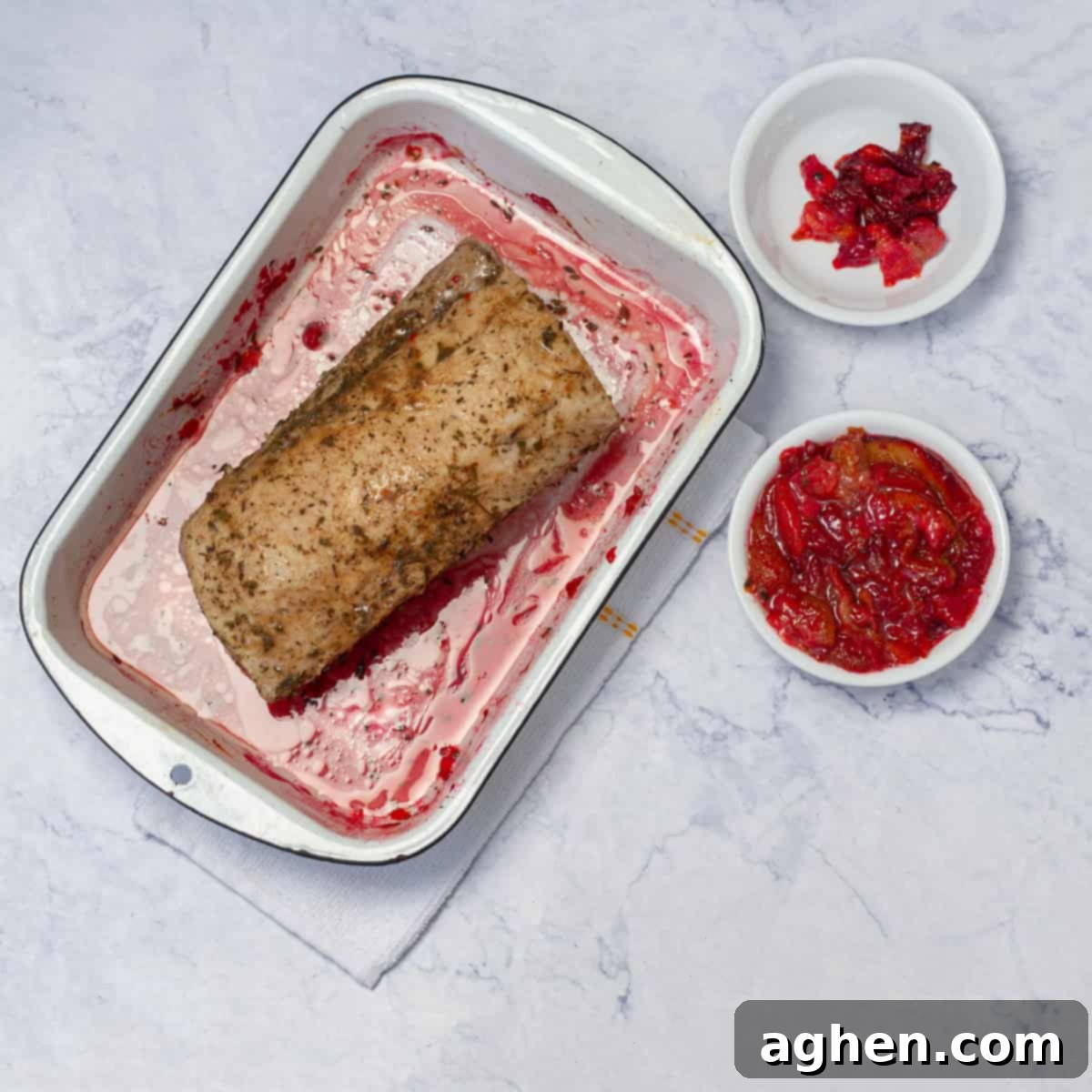 Plum-Glazed Pork Loin 7 Pork loin in plum sauce in baking tray