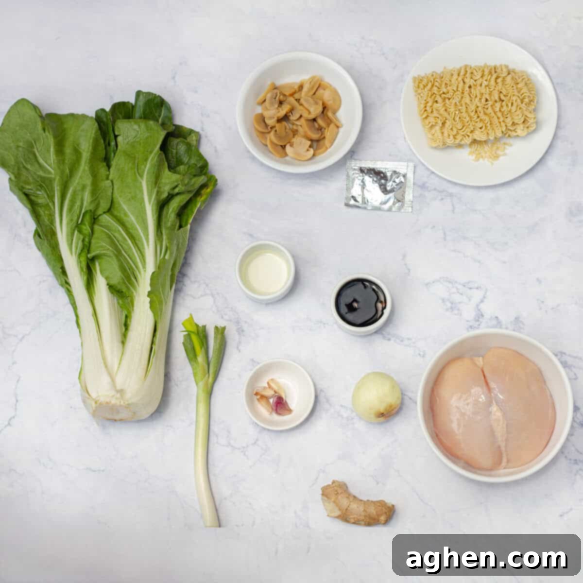 Light & Flavorful Asian Chicken Soup A Modern Take 3 Asian Chicken Soup Ingredients laid out on a cutting board