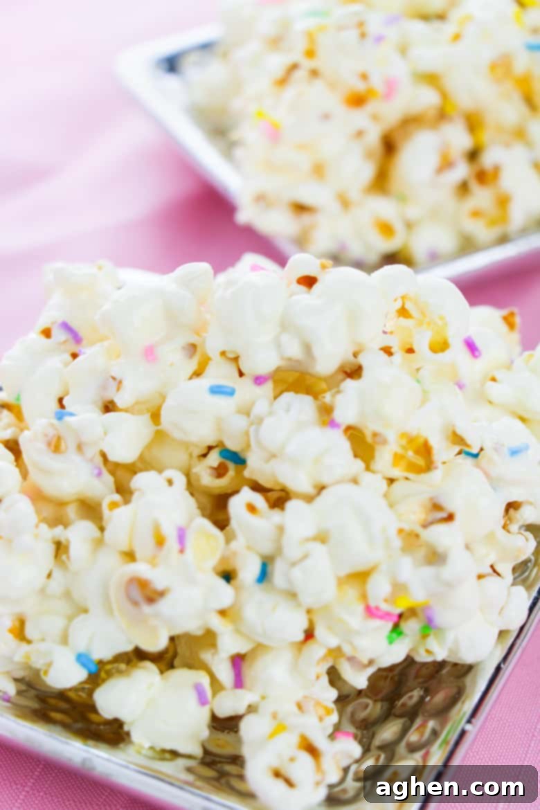 Funfetti popcorn served on two small silver platters
