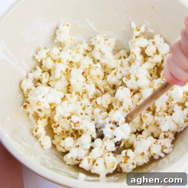 Mixing popcorn in bowl