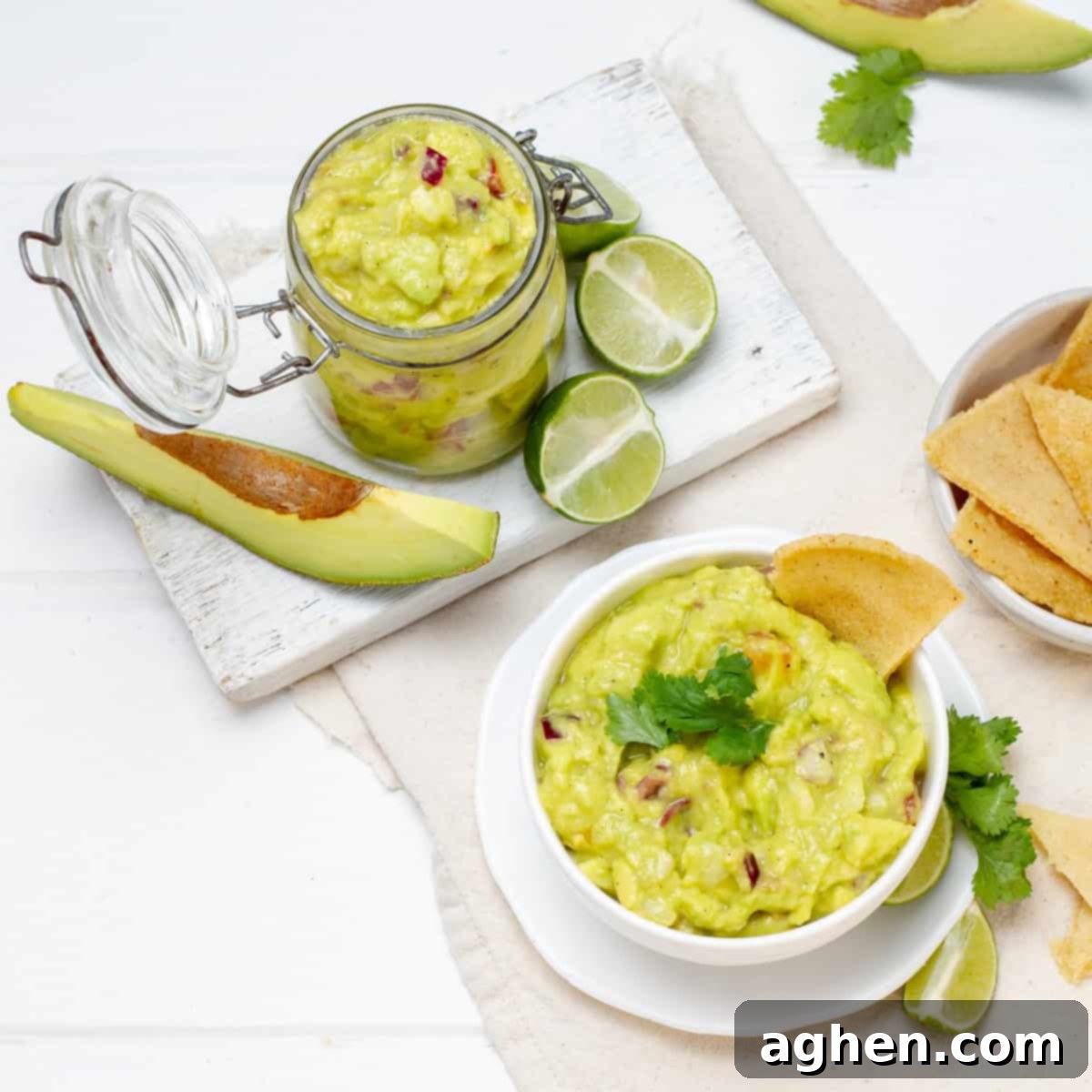 This Must-Try Weight Watchers Guacamole 2 Guacamole served in a bowl with lemon and avocado slices