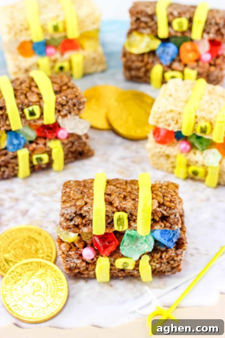 Treasure chests made out of rice krispie treats and candy, showcasing colorful edible treasures.
