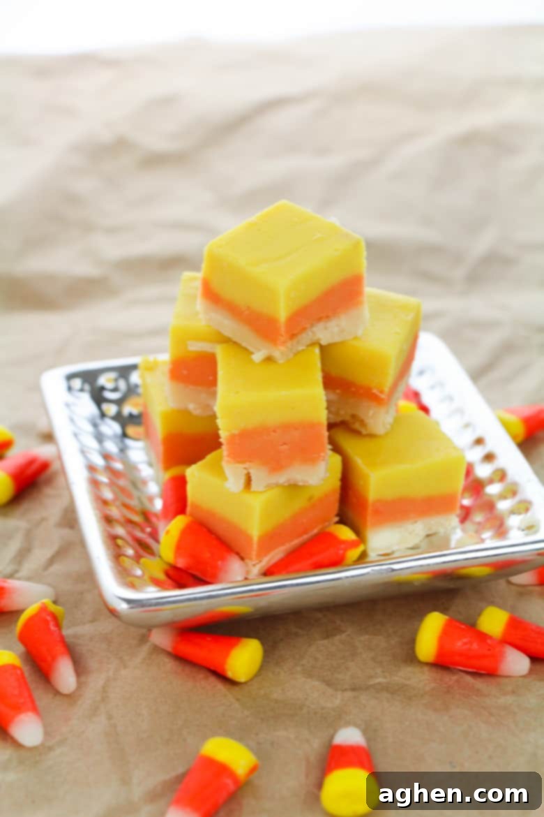 Yellow, orange, and white layered fudge resembling candy corn
