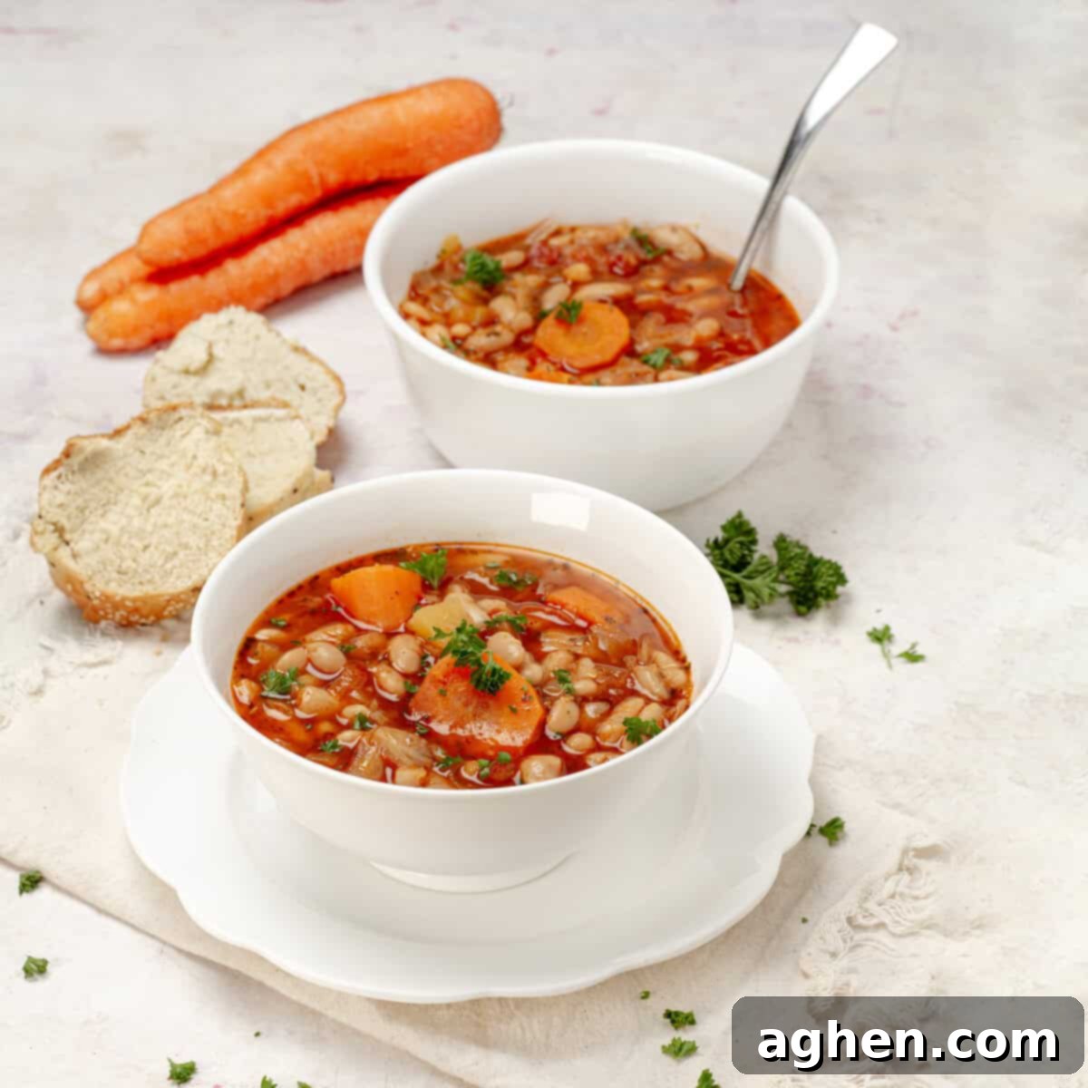 Cabbage Soup: Weight Watchers' Enduring Slimming Secret 2 Savory and filling cabbage soup with hearty vegetables and white beans, garnished with fresh herbs.