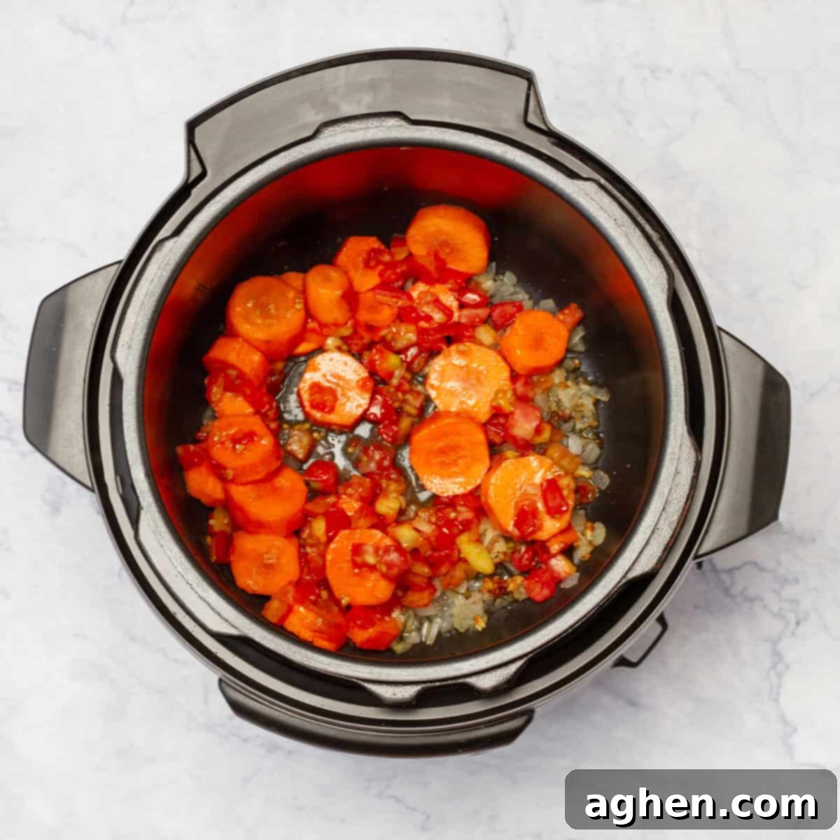 Cabbage Soup: Weight Watchers' Enduring Slimming Secret 5 Add the carrots and tomato paste to the aromatic base in the Instant Pot.