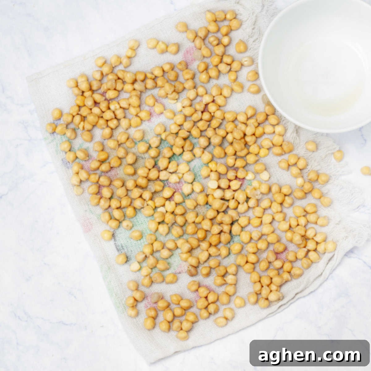 Drain the soaked chickpeas and dry on a clean towel. 