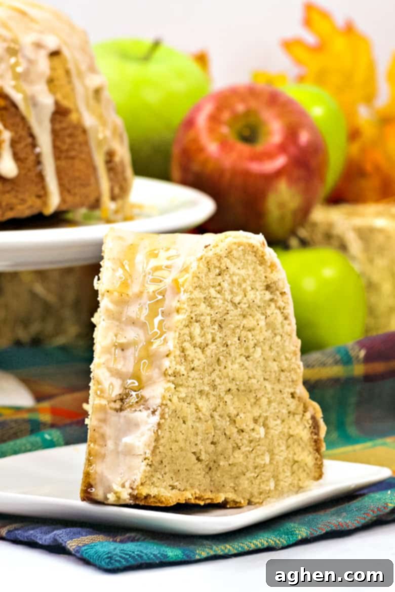 A beautifully glazed Apple Cider Bundt Cake, ready to be served