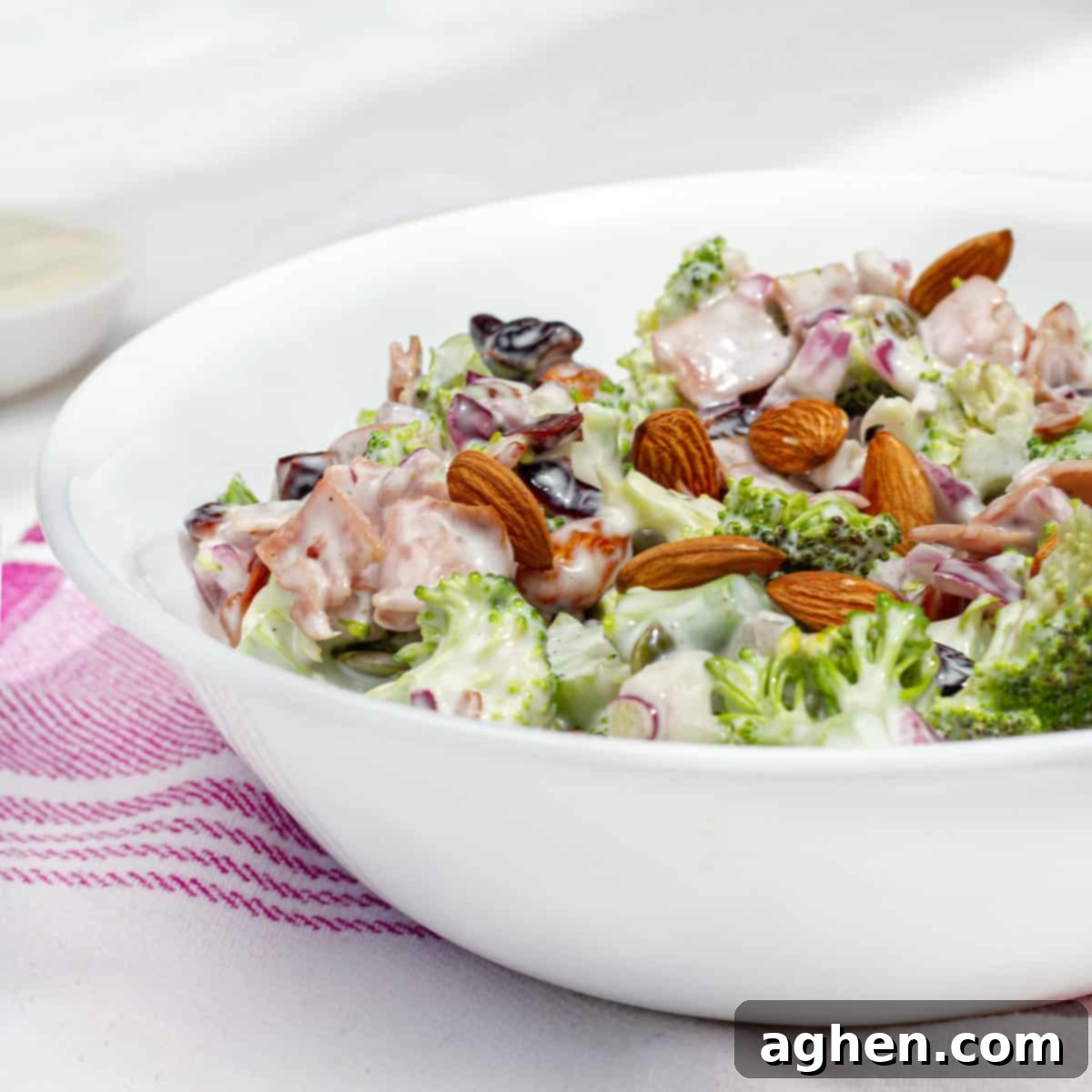 A healthy yet creamy twist on the classic Midwestern broccoli salad with ham and dried cranberries.