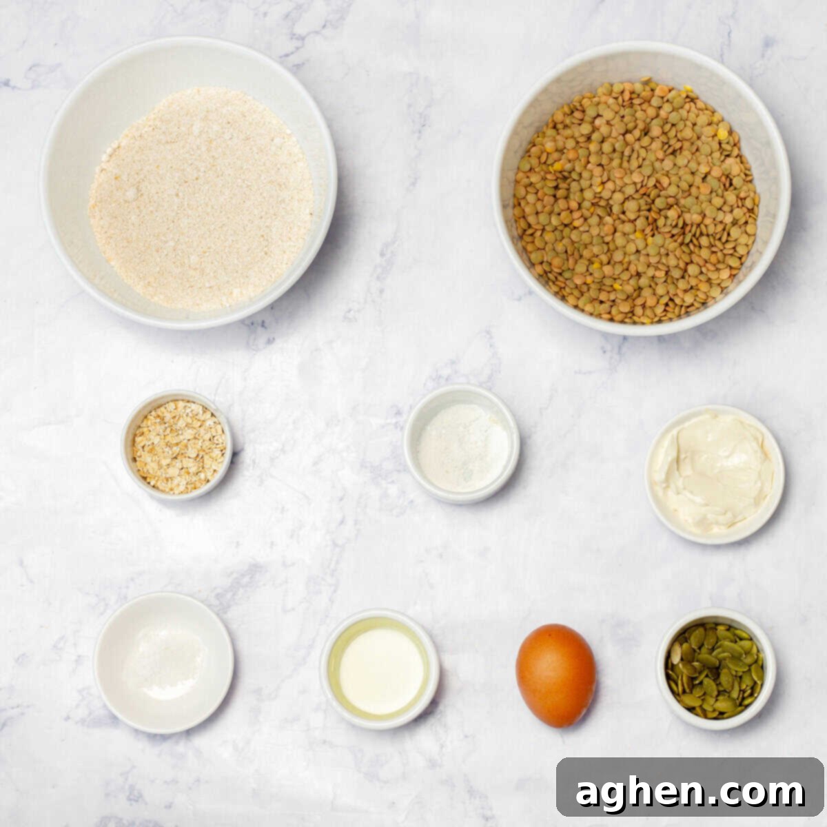 Lentil bread ingredients, including soaked lentils, oat flour, Greek yogurt, an egg, nuts, and seeds.