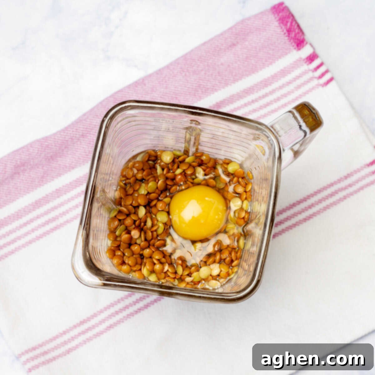 Soaked lentils, egg, water, oil, baking powder, salt, and Greek yogurt in the blender. 