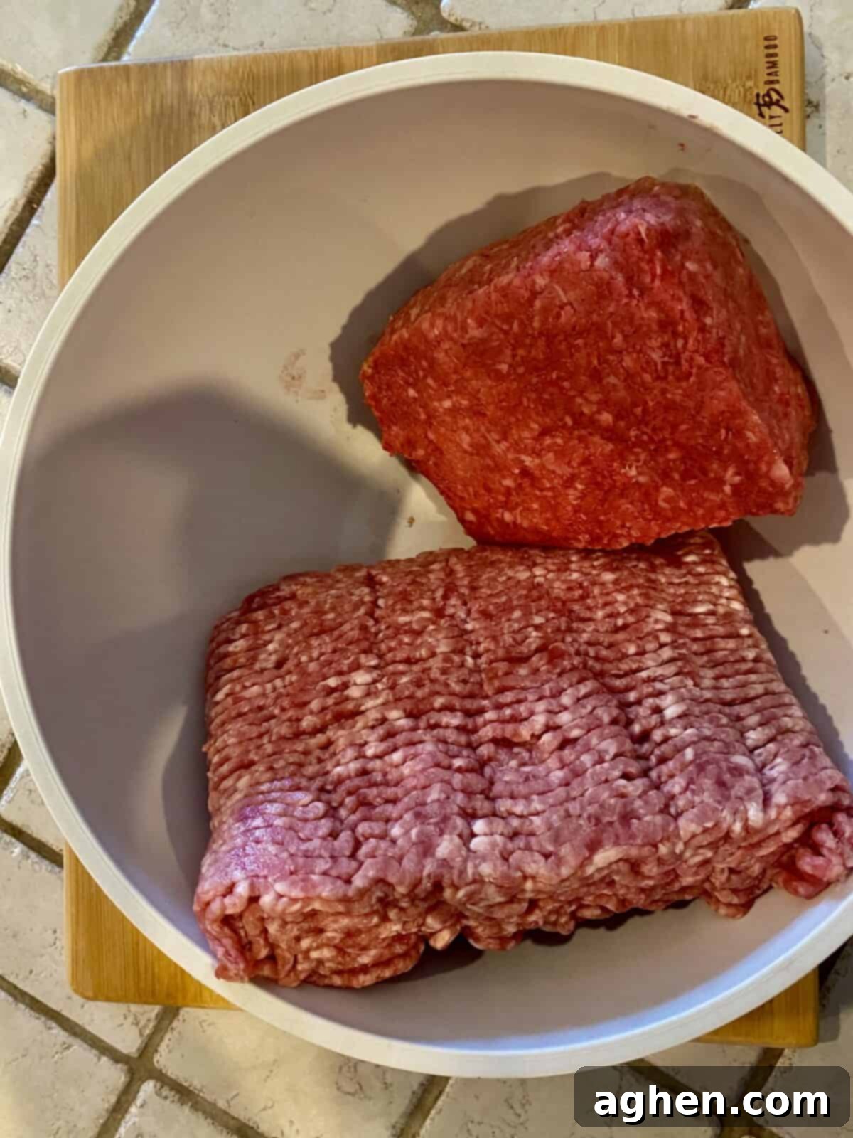 Meatloaf shaped into a loaf pan, ready for the grill