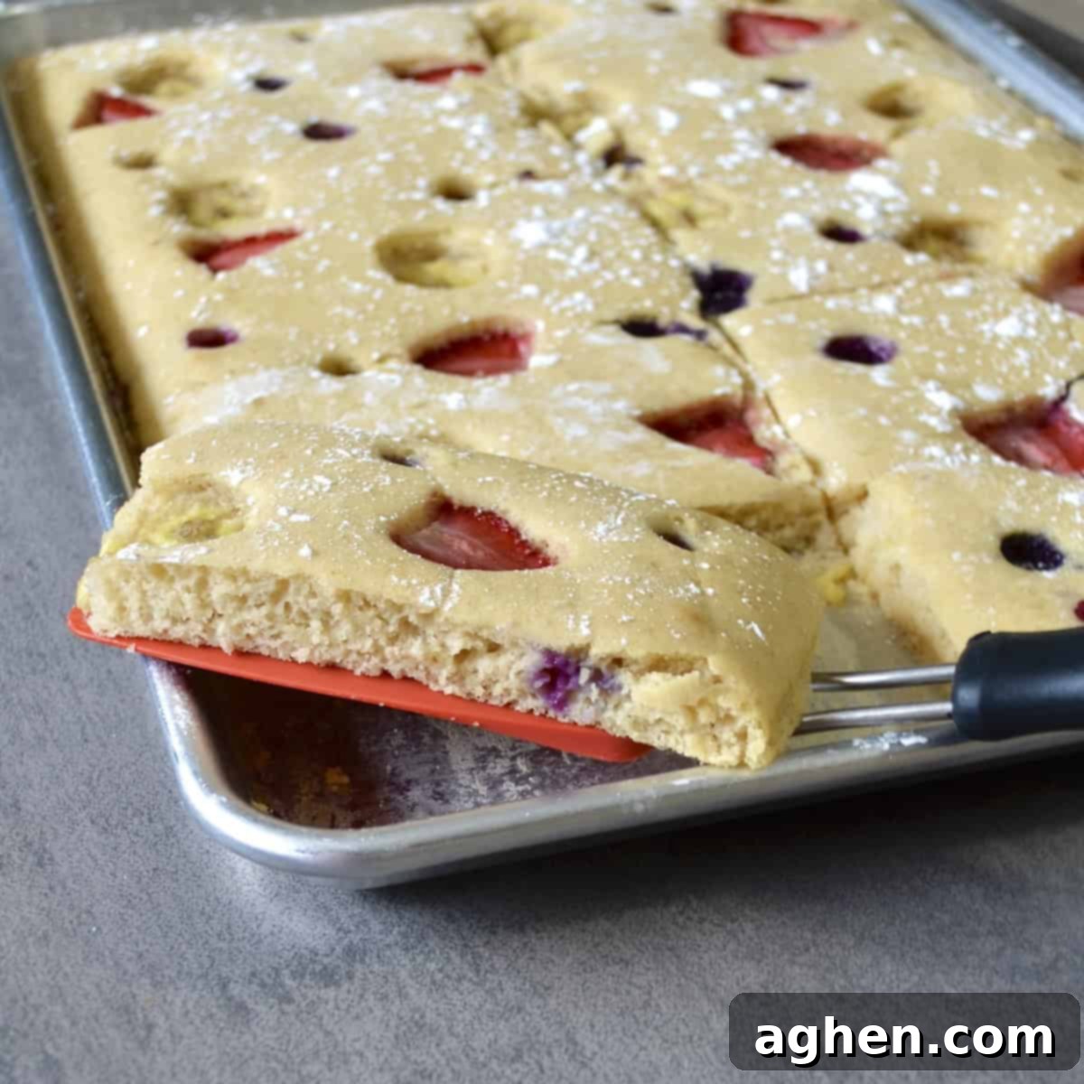 Serving baked pancakes with a spatula