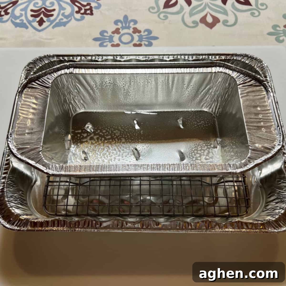 The Cookout's Must-Have Smoked Meatloaf (Recipe Included!) 5 Drip pan and loaf pan prepared for smoking meatloaf