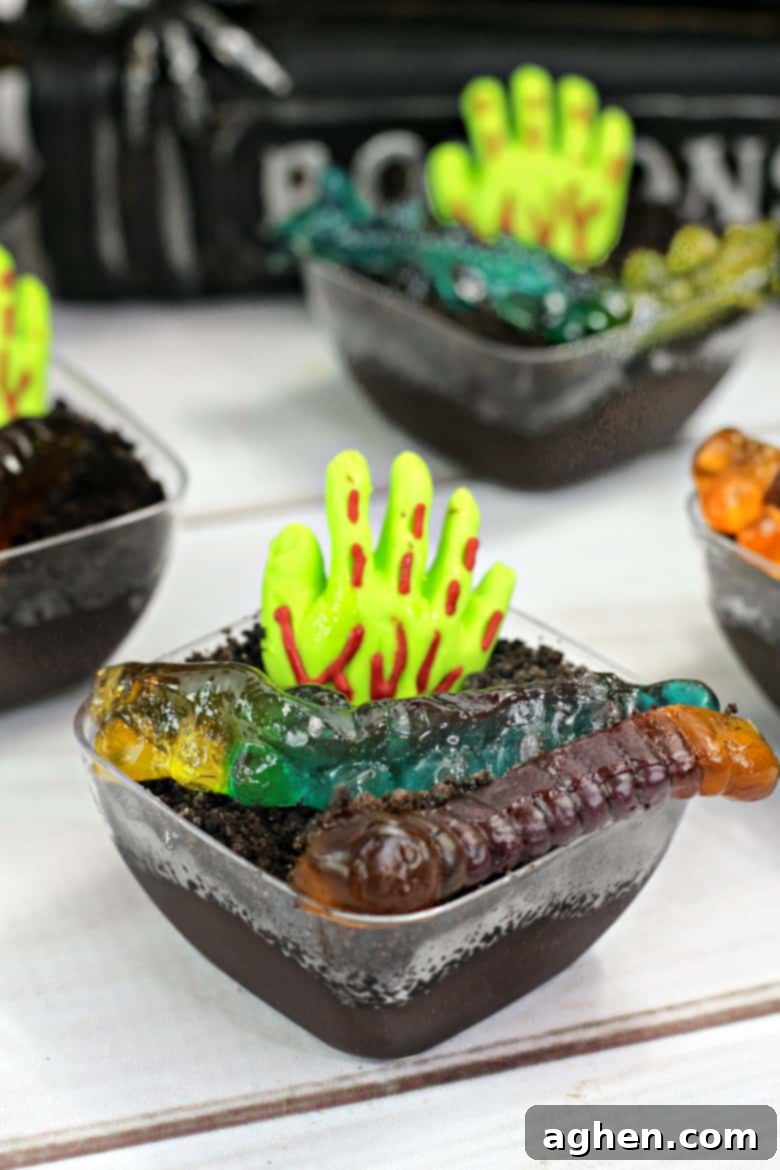 Graveyard Pudding Cups arranged for a Halloween party, highlighting individual servings
