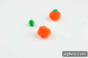 Press Pom Poms together