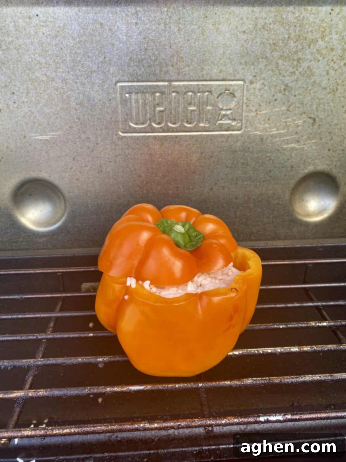 Weber Grills Ideal For Plant Based Diets 3 stuffed peppers cooking on weber grill