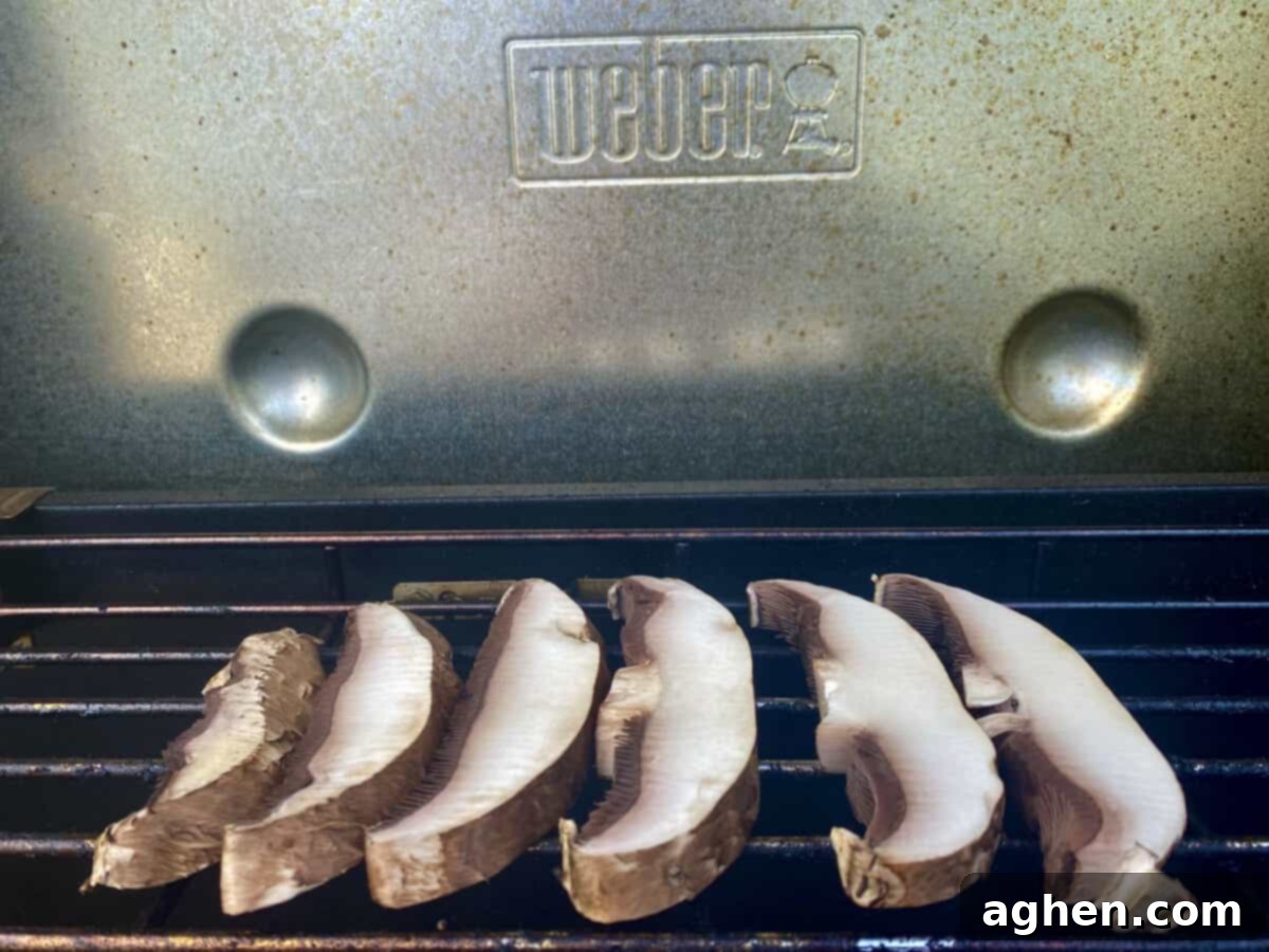 Weber Grills Ideal For Plant Based Diets 4 mushrooms cooking on weber