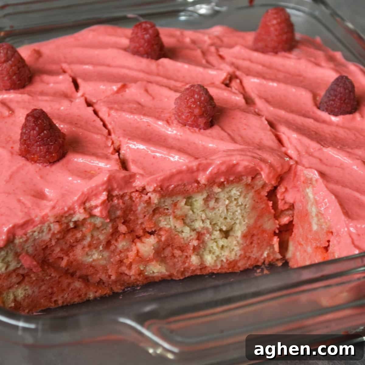 Indulgent Raspberry Poke Cake Weight Watchers Approved 6 Sliced raspberry cake with fresh raspberries