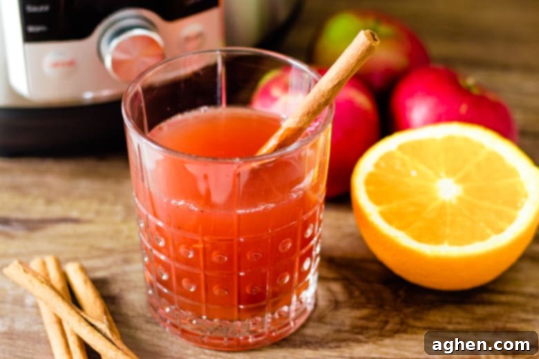 apple cider in glass on table