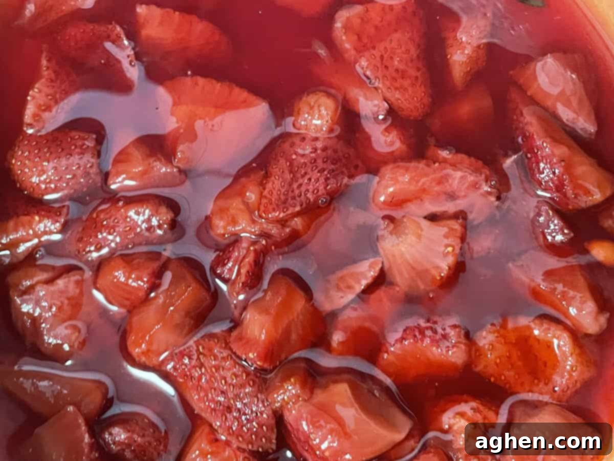 Blackstone's Jumbo Strawberry Pancakes: Every Kid's Dream 13 Blackstone pancake batter being mixed with a wooden spoon