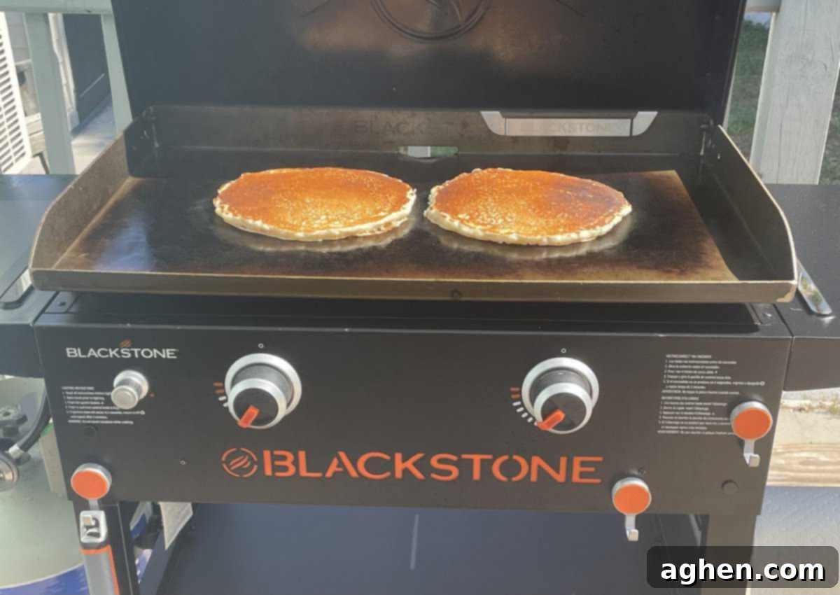 Blackstone's Jumbo Strawberry Pancakes: Every Kid's Dream 4 A diner-style hubcap-sized pancake on a plate