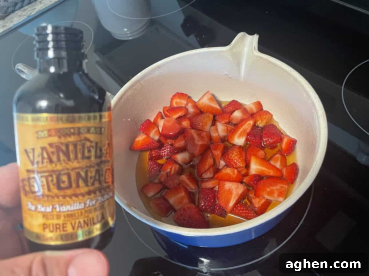 Blackstone's Jumbo Strawberry Pancakes: Every Kid's Dream 9 Freshly made strawberry compote in a pot