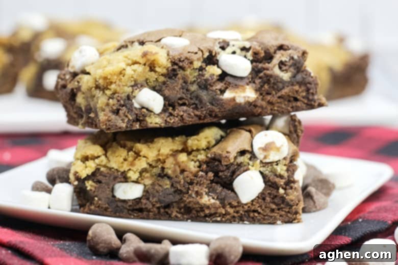 Another stunning stack of hot chocolate brookies, showcasing the layers and delicious texture on a white plate.