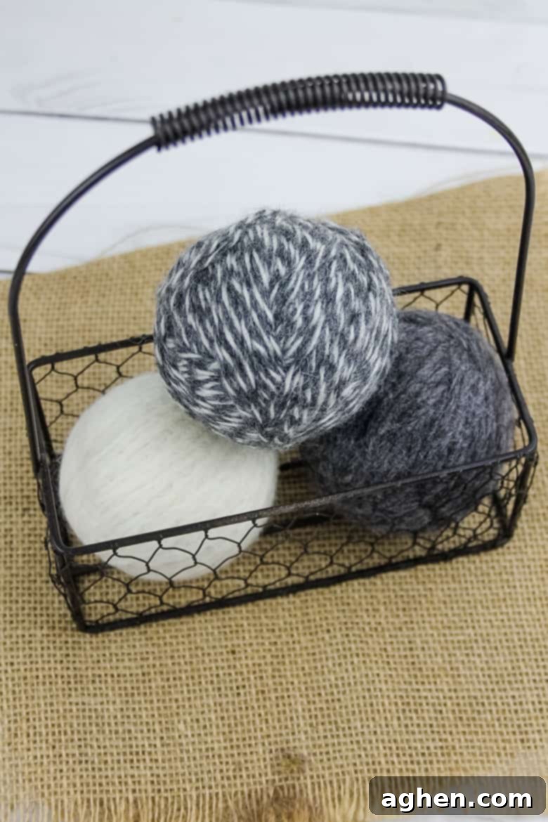 DIY wool dryer balls in a natural basket, highlighting the eco-friendly laundry solution