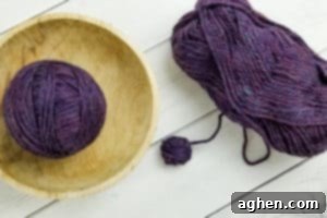 Roll yarn into dense wool dryer balls