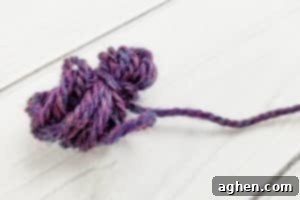 Pinch and wrap yarn for homemade dryer balls