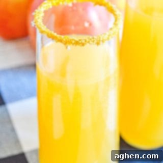 apple cider mimosas sitting on a table
