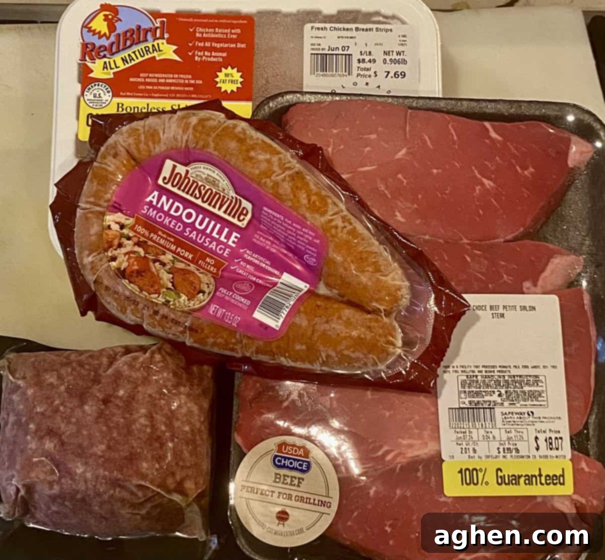 A person grilling a variety of foods on a Weber gas grill, with fresh ingredients laid out nearby.