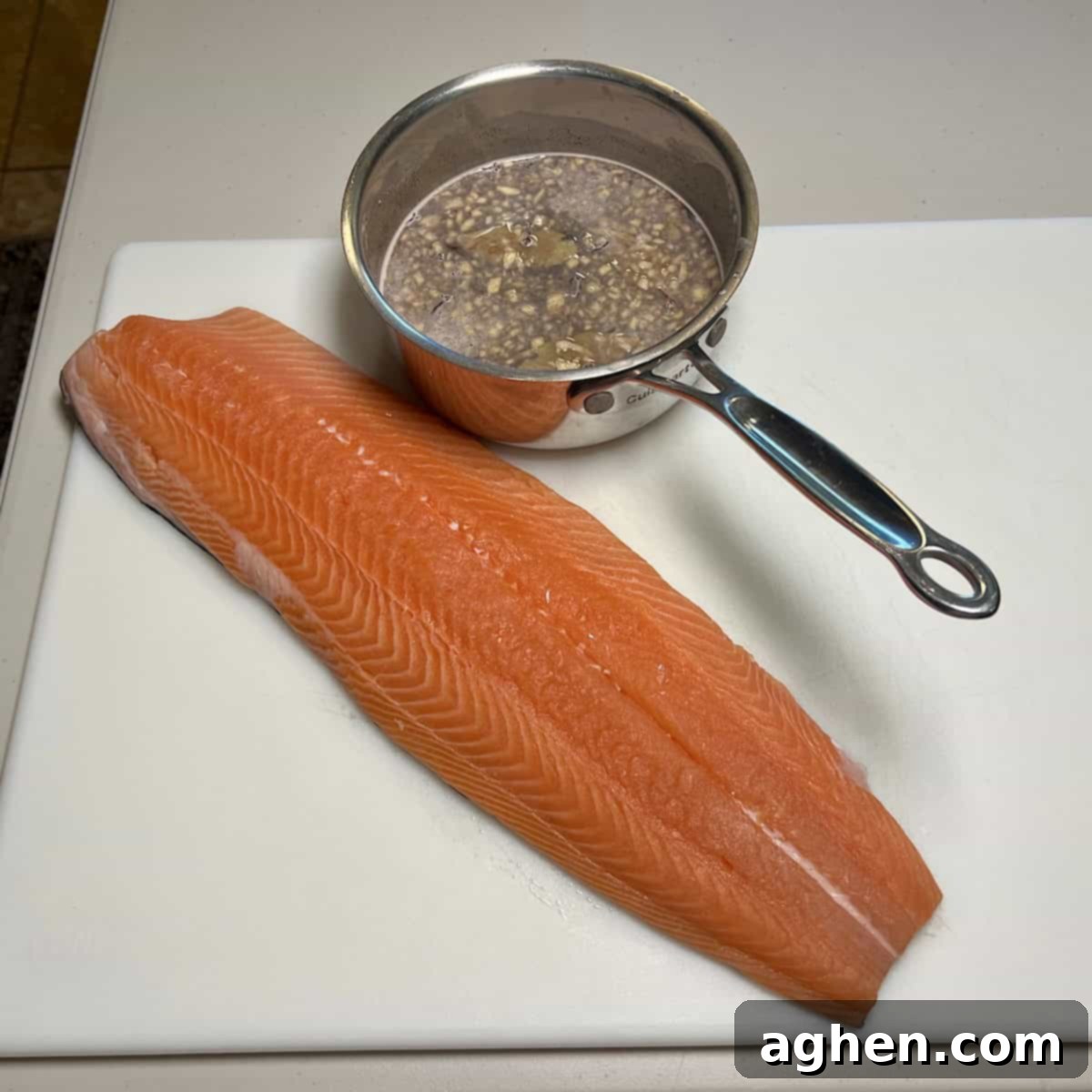 Crafting Perfect Smoked Salmon with Your Offset Smoker 5 Salmon in a pot with brine