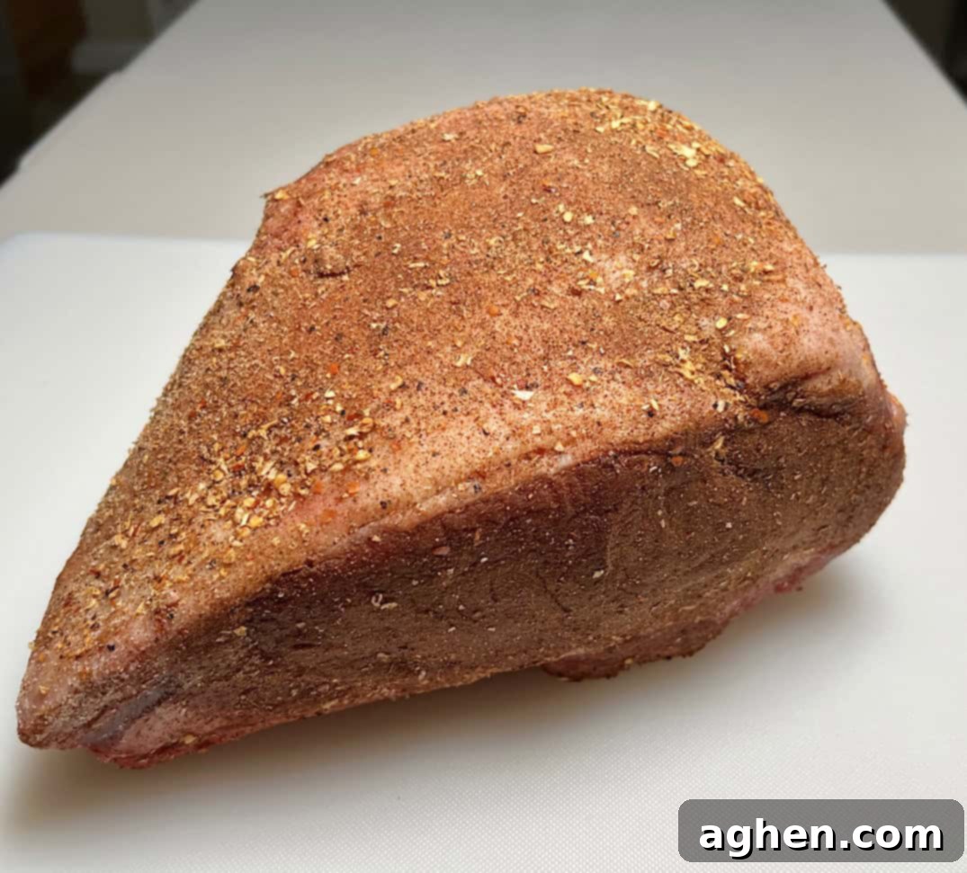 Another angle of the prime rib roast, fully seasoned.