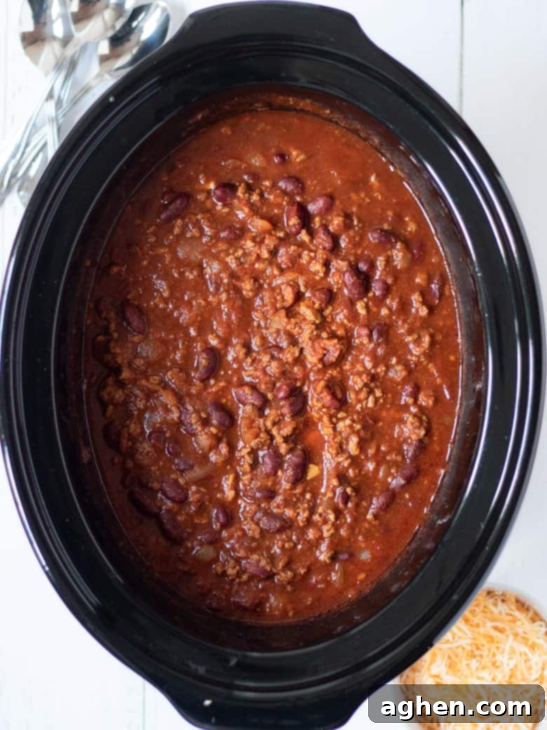 Ultimate Slow Cooker Chili 3 Slow Cooker with beef chili in it.