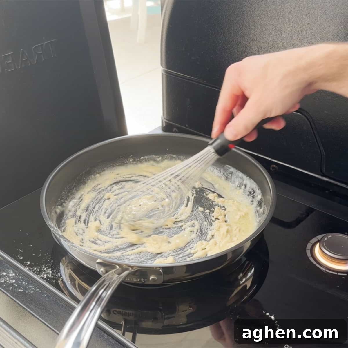 The Definitive Backyard Smoked Mac & Cheese 5 Making a roux in a saucepan.